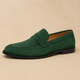 Men's flat penny strap loafers with almond toes and stitched uppers