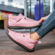 Women's low-top casual sneakers with laces, contrast stitching and textured soles