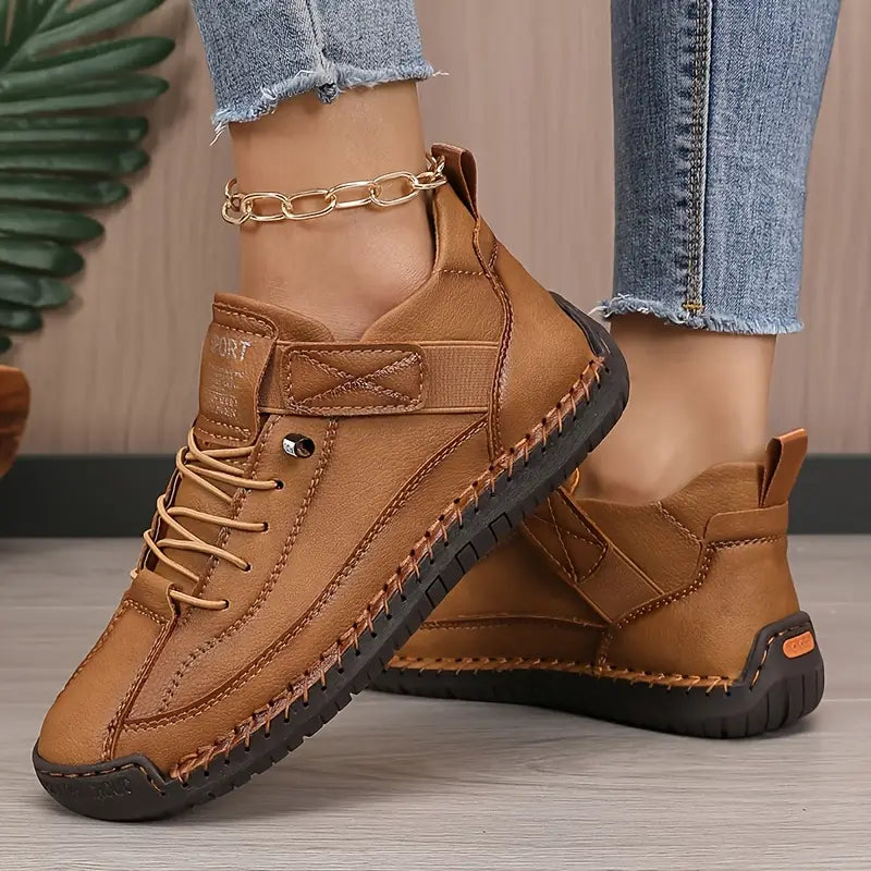 Unisex lace-up high-top sneakers with round toes and flat soles