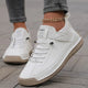 Unisex lace-up high-top sneakers with round toes and flat soles