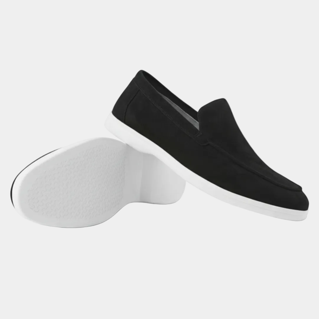 Men's slip-on loafers with visible stitching and light-coloured soles