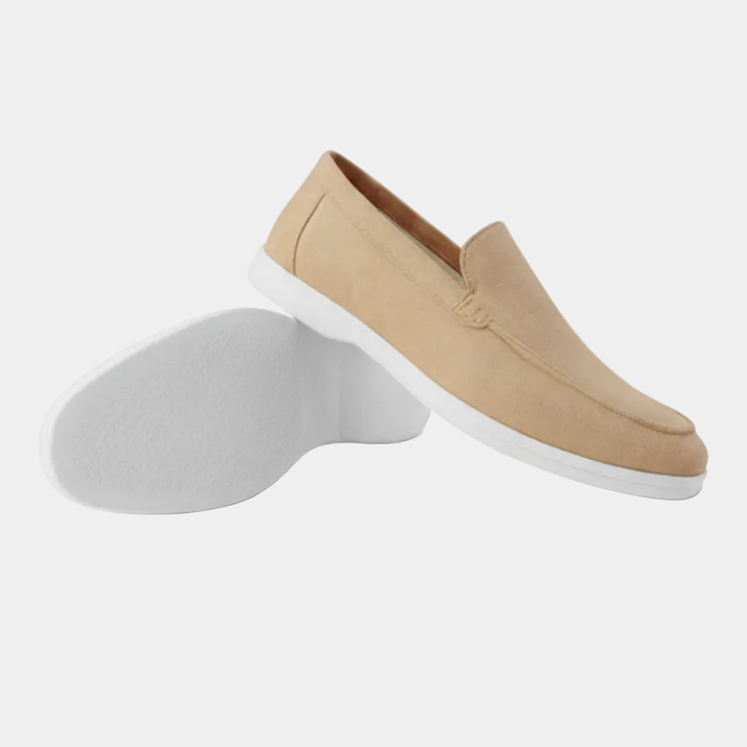 Men's slip-on loafers with visible stitching and light-coloured soles