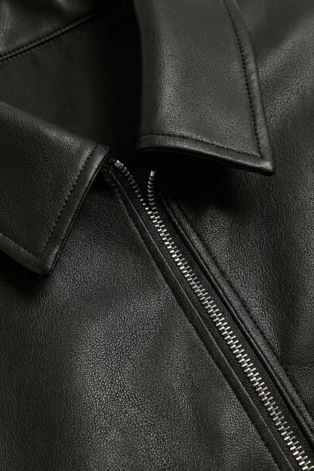 Black zip-front jacket with point collar