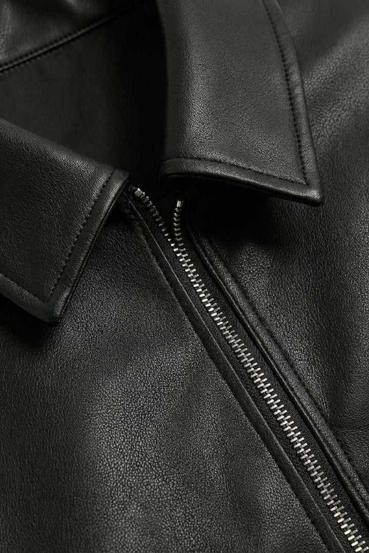 Black zip-front jacket with point collar