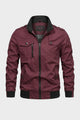Men's utility jacket with stand collar, zip front, chest pockets and ribbed trim