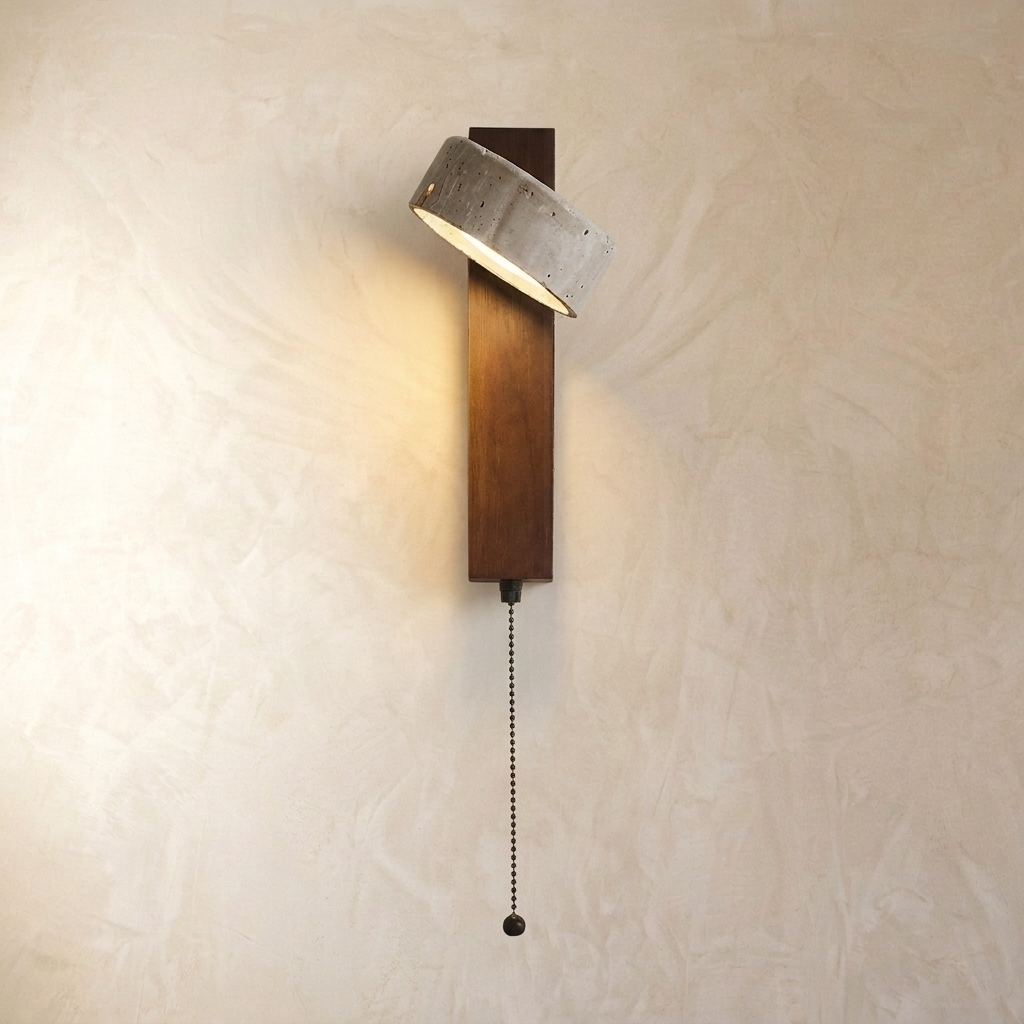 Adjustable wall light with a natural travertine stone finish