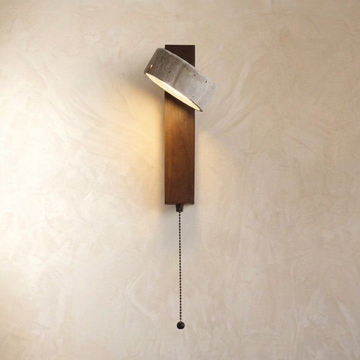 Adjustable wall light with a natural travertine stone finish