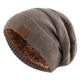Men's textured knitted slouch beanie with plush lining and side label