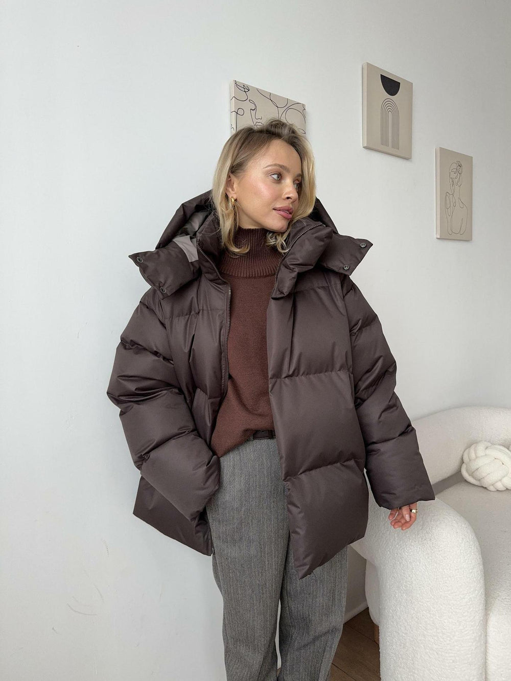 Women's oversized hooded puffer jacket with zip front
