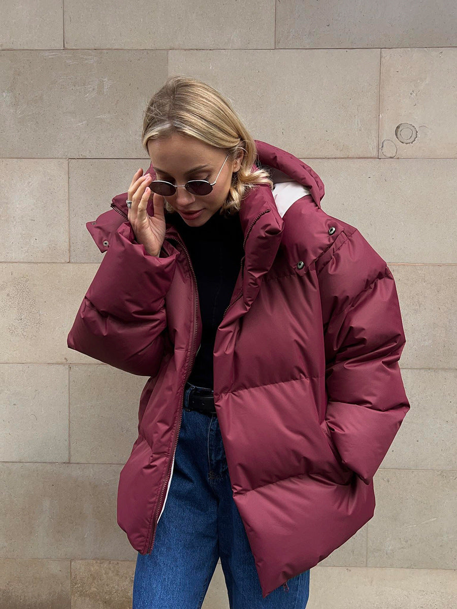 Women's oversized hooded puffer jacket with zip front