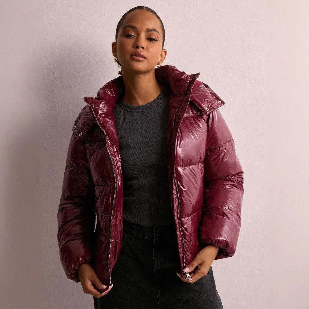 Women's glossy quilted puffer jacket with hood and front zip