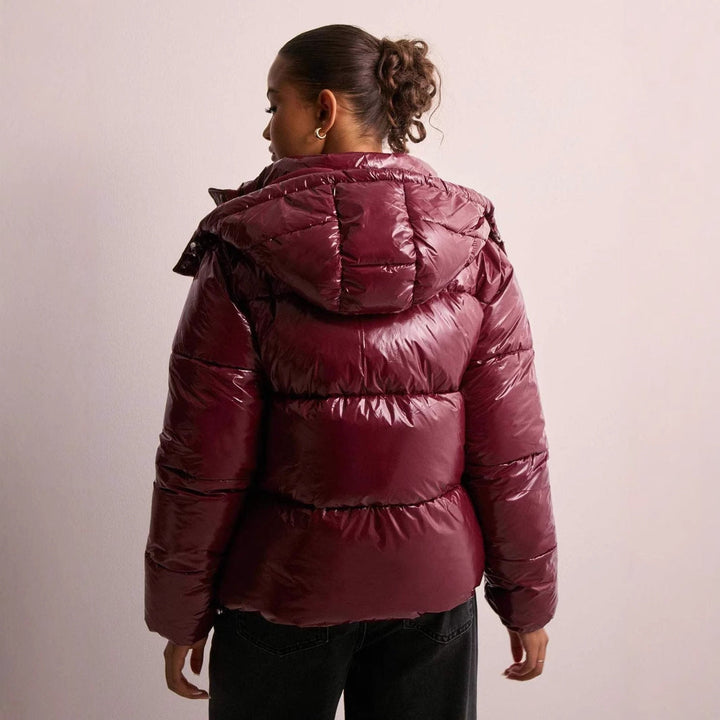 Women's glossy quilted puffer jacket with hood and front zip