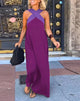 Women's sleeveless maxi dress with crossed halter neckline in black and white colourway