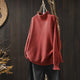 Women's textured knit sweater with ribbed crew neck and long sleeves