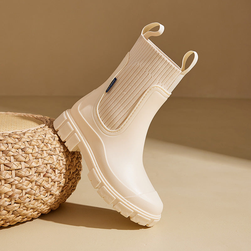Women's Chelsea-style ankle rain boots with lug sole