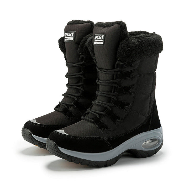 High-top winter lace-up boots with plush black trim and chunky ridged soles