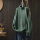 Women's textured knit sweater with ribbed crew neck and long sleeves