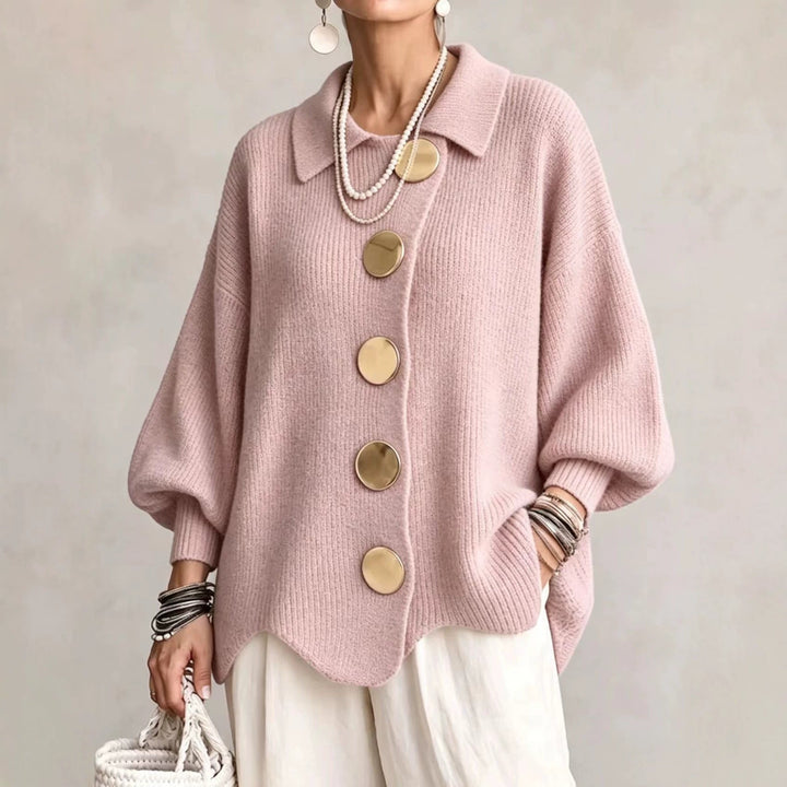Women's oversized textured collared cardigan with large buttons and curved hem