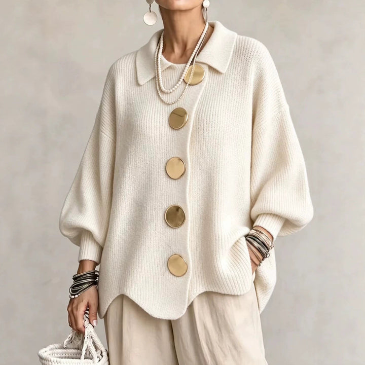 Women's oversized textured collared cardigan with large buttons and curved hem