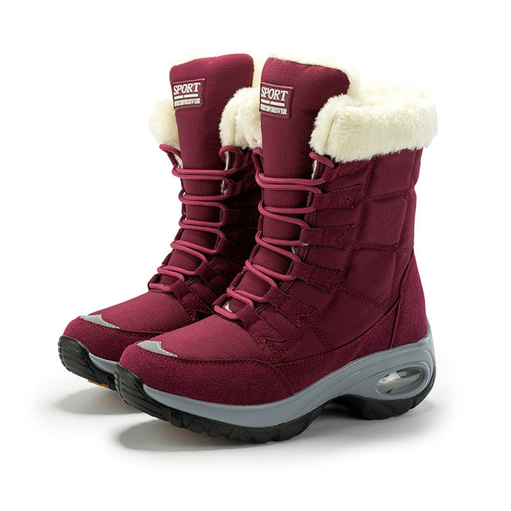 High-top winter lace-up boots with plush black trim and chunky ridged soles