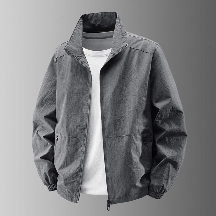 Men's solid bomber jacket with stand collar, zip front and zipped pockets