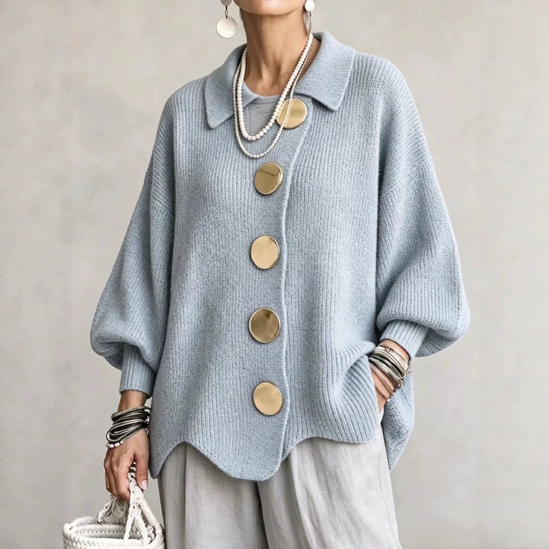 Women's oversized textured collared cardigan with large buttons and curved hem