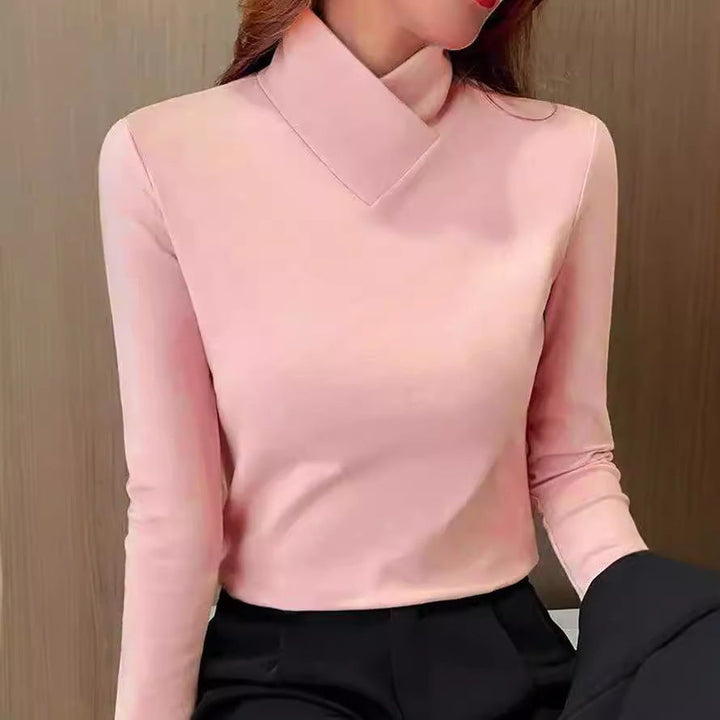 Women's solid long-sleeve turtleneck T-shirt with fitted cut and hip-length hem