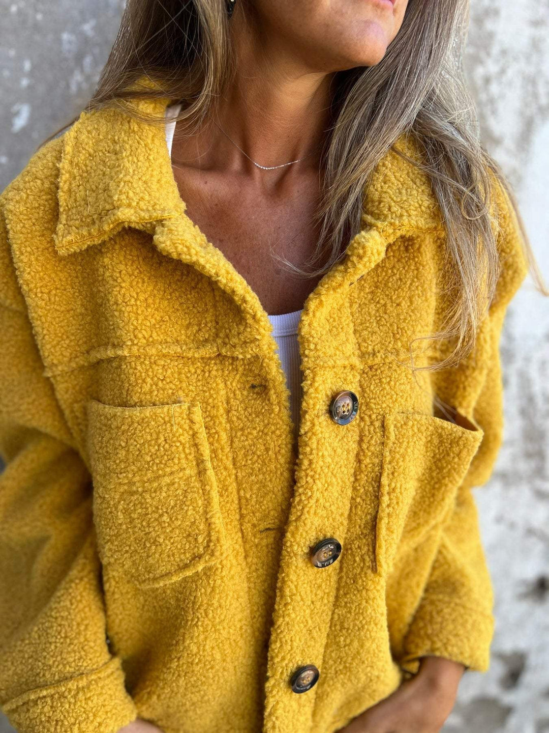 Women's textured fleece jacket with collar and button front