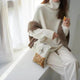 Women's relaxed turtleneck sweater with long sleeves and ribbed trims