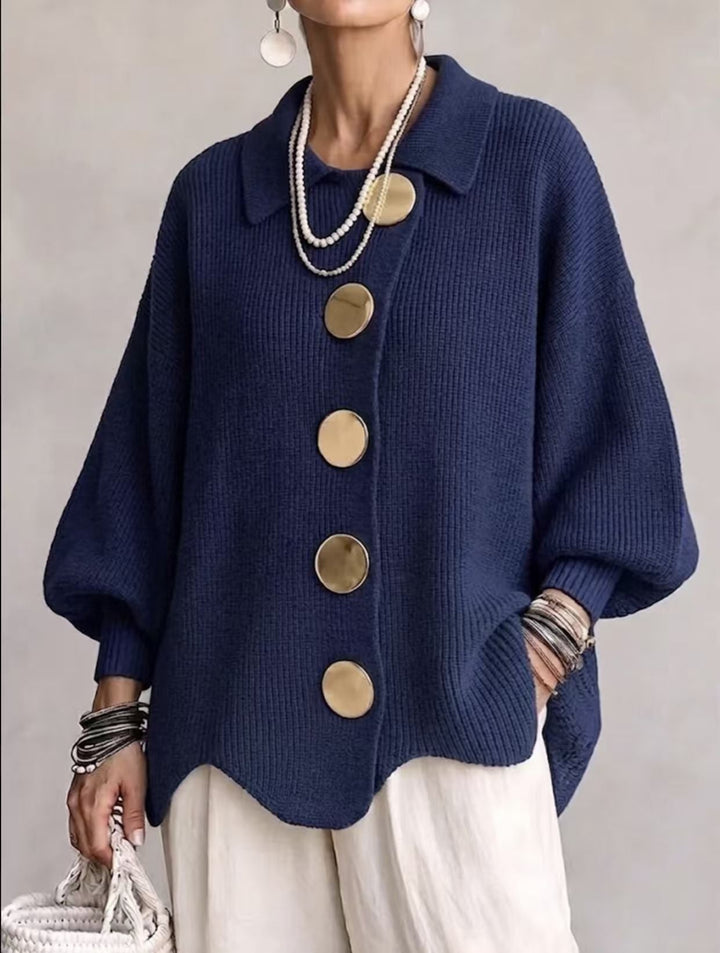 Women's oversized textured collared cardigan with large buttons and curved hem