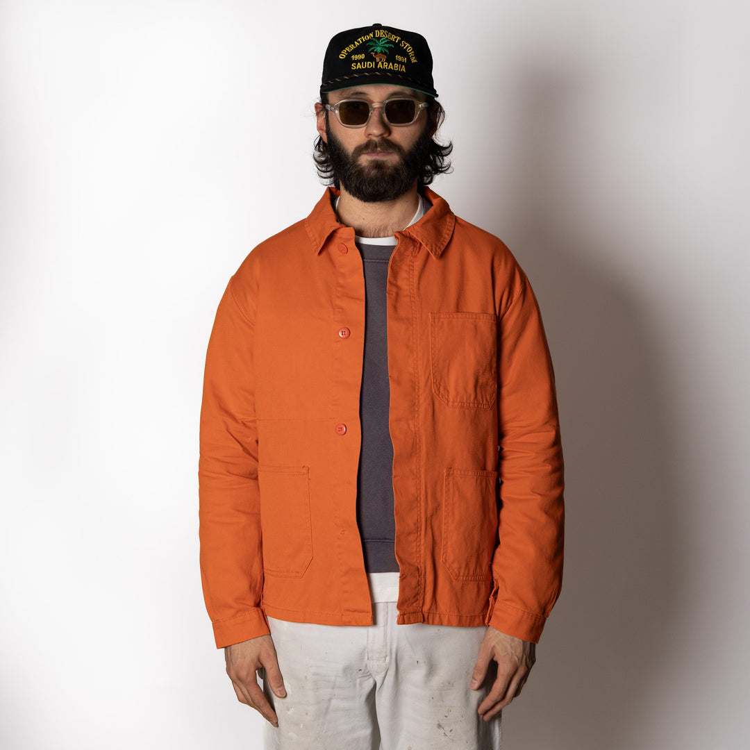 Orange utility jacket with four patch pockets