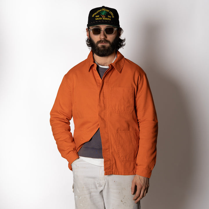 Orange utility jacket with four patch pockets