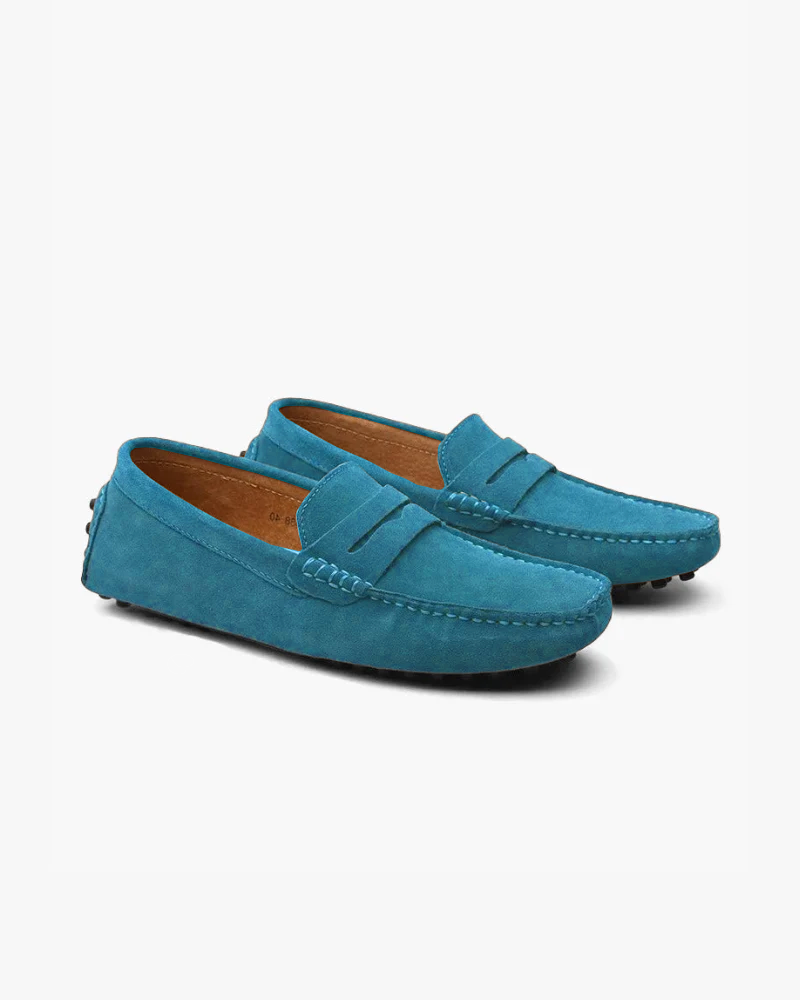 Men's penny loafers with rounded moc toes, vamp straps and stitched detailing