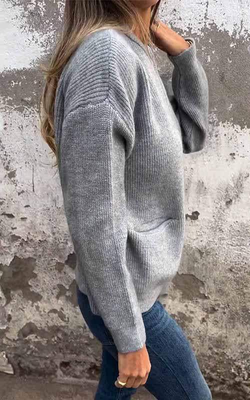 Women's knitted zip jacket with ribbed collar, long sleeves and front pockets