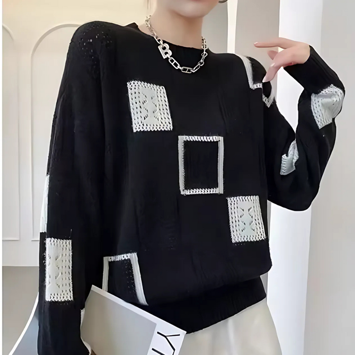 Women's patchwork crew-neck sweater with contrasting geometric panels