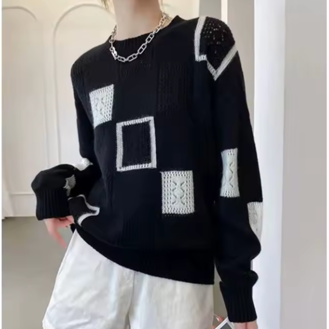 Women's patchwork crew-neck sweater with contrasting geometric panels