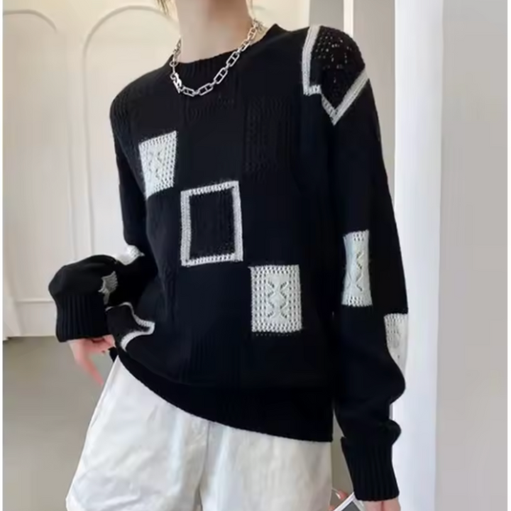 Women's patchwork crew-neck sweater with contrasting geometric panels