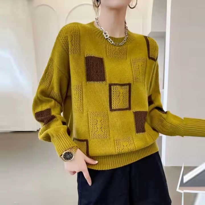 Women's patchwork crew-neck sweater with contrasting geometric panels