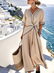 Women's wrap midi dress with V-neckline, short sleeves, and contrast trim in blue