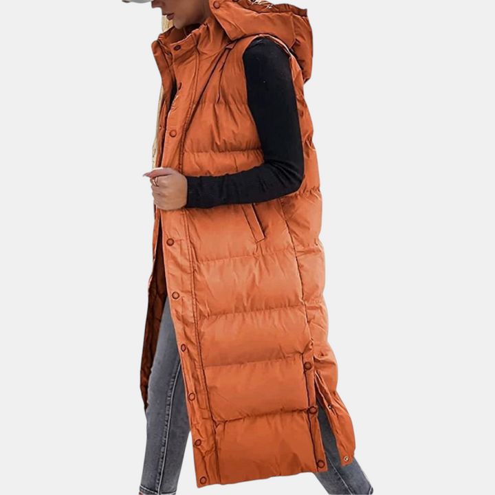 Women's long hooded puffer gilet with snap front and side pockets