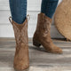 Women's brown cowboy boots with embroidered shafts and low block heels