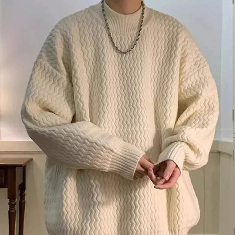 Oversized wavy knit sweater with crew neck, long sleeves and ribbed trims