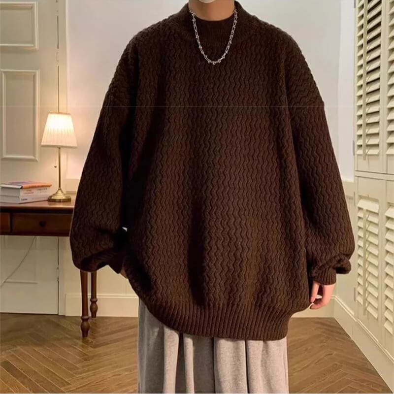 Oversized wavy knit sweater with crew neck, long sleeves and ribbed trims