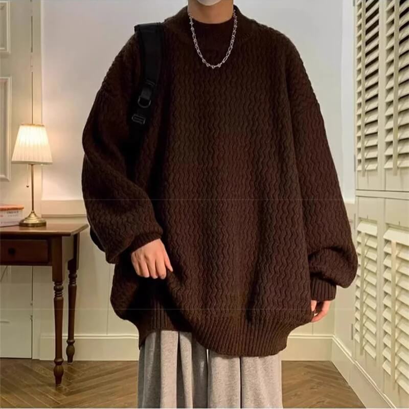 Oversized wavy knit sweater with crew neck, long sleeves and ribbed trims