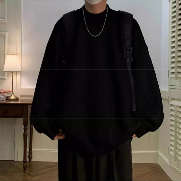 Oversized wavy knit sweater with crew neck, long sleeves and ribbed trims