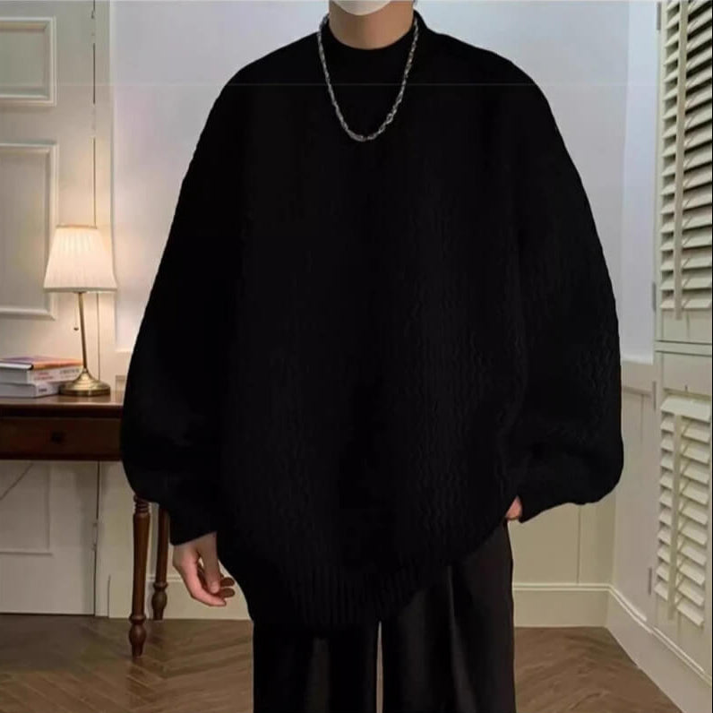 Oversized wavy knit sweater with crew neck, long sleeves and ribbed trims
