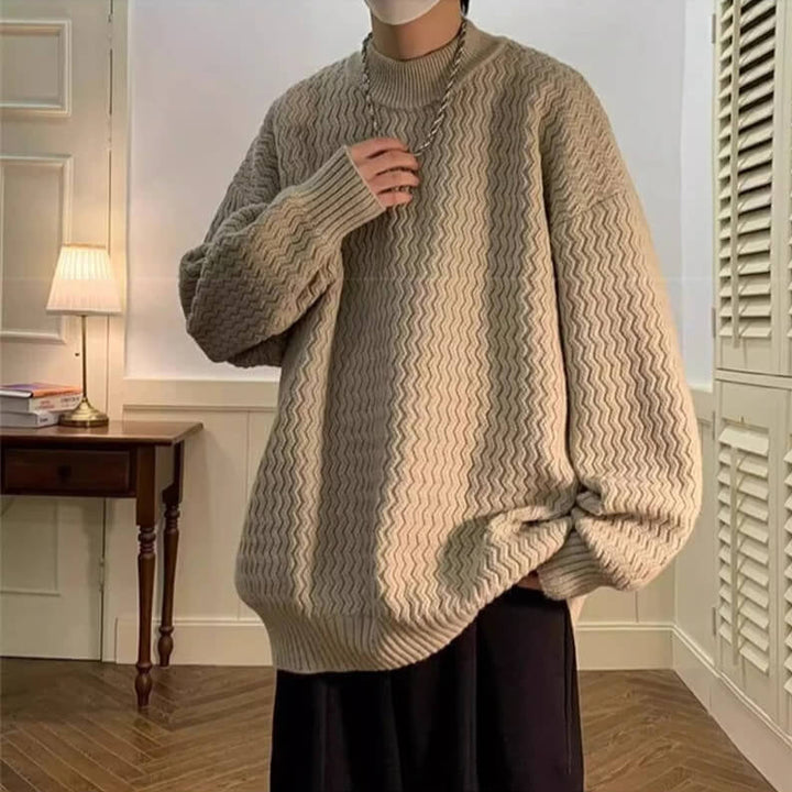 Oversized wavy knit sweater with crew neck, long sleeves and ribbed trims