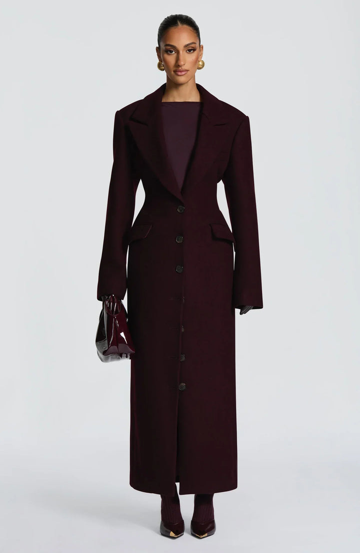 Women's burgundy tailored longline coat with notch lapels and button front