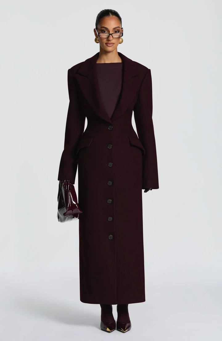 Women's burgundy tailored longline coat with notch lapels and button front