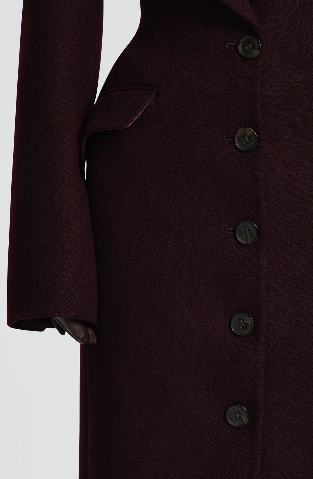 Women's burgundy tailored longline coat with notch lapels and button front